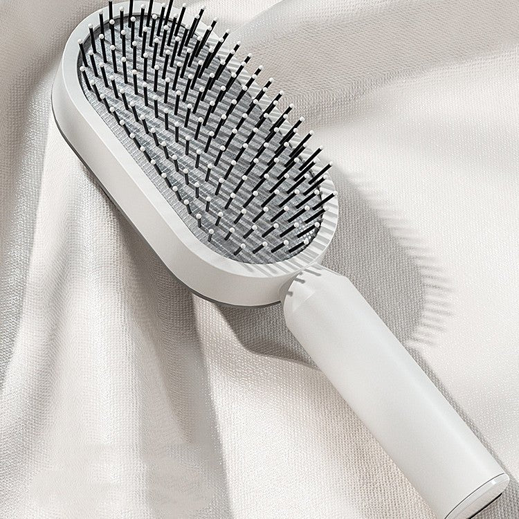 Self - Cleaning Hairbrush with Airbag Massage - Dot Com Product