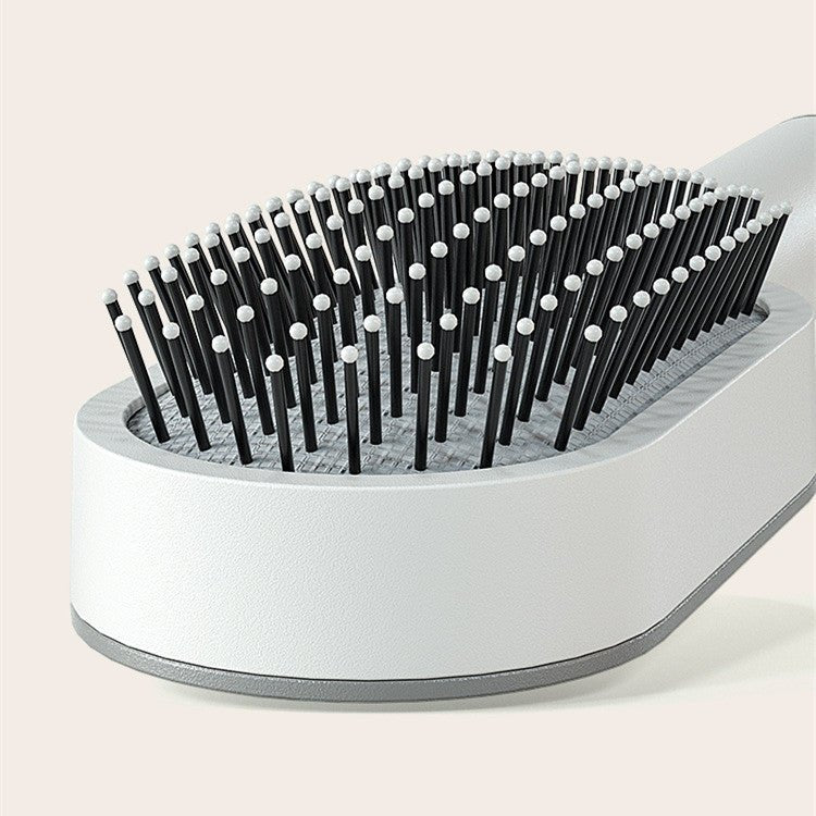 Self - Cleaning Hairbrush with Airbag Massage - Dot Com Product